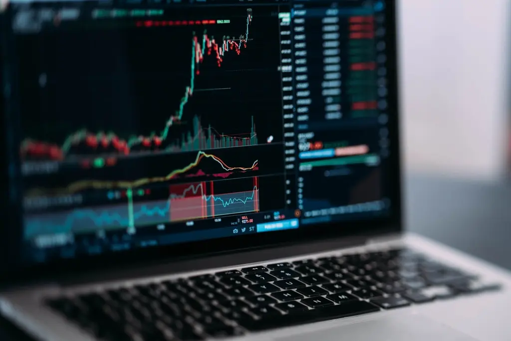 Trading and analytics panel displayed on a laptop screen