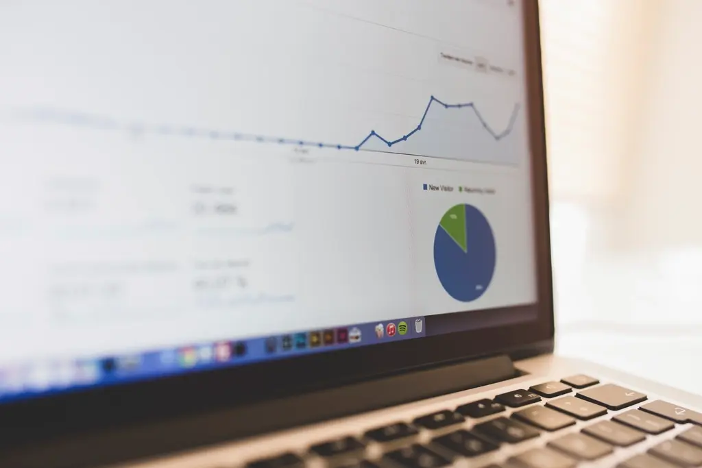Laptop displaying a business data dashboard, representing CRM portal development companies in the UAE