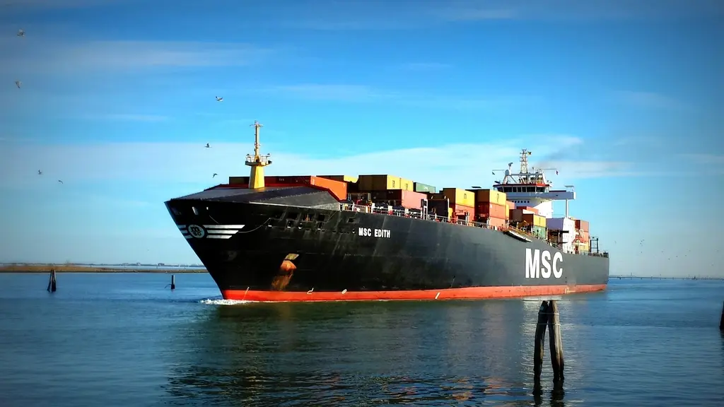 Cargo ship at port loaded with shipping containers