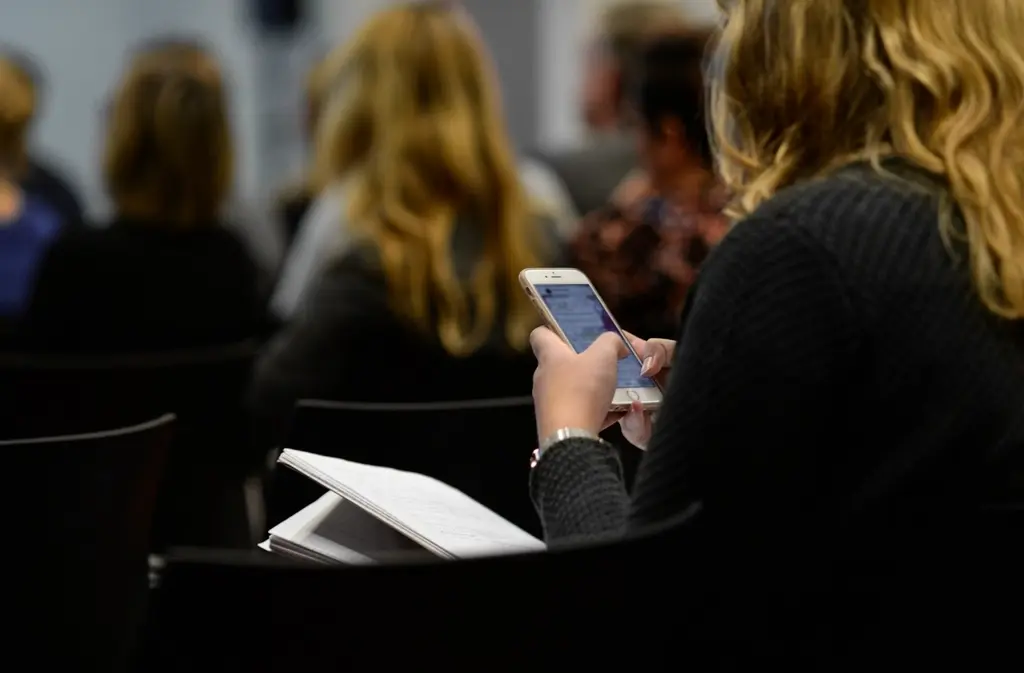 Person sending a message on a smartphone, representing WhatsApp CRM integration for Dubai businesses