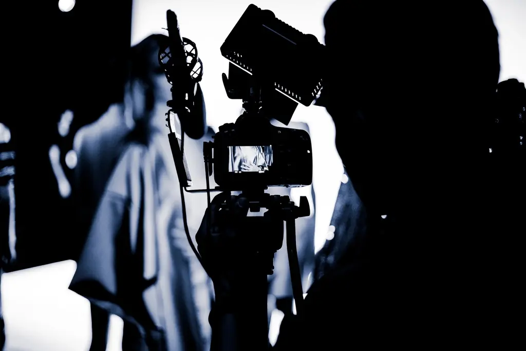 Camera and lighting equipment set up for a video shoot