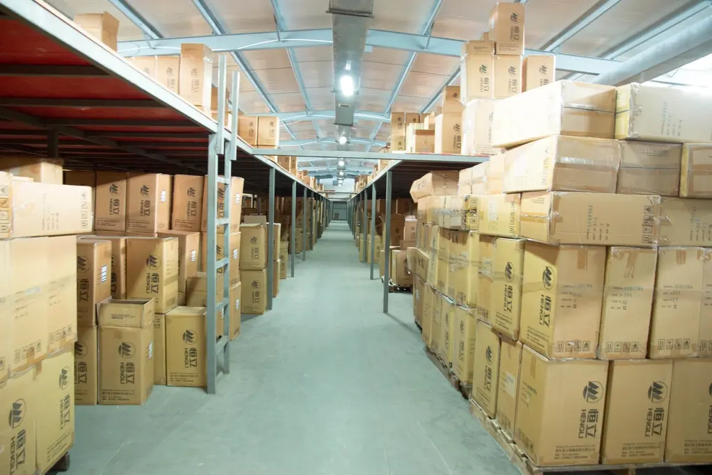 Boxes and inventory stored in a warehouse facility