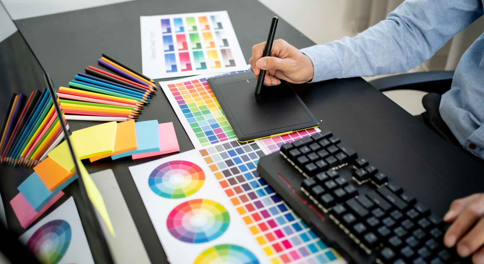 Zenexio graphic designer working with colour palette, Dubai