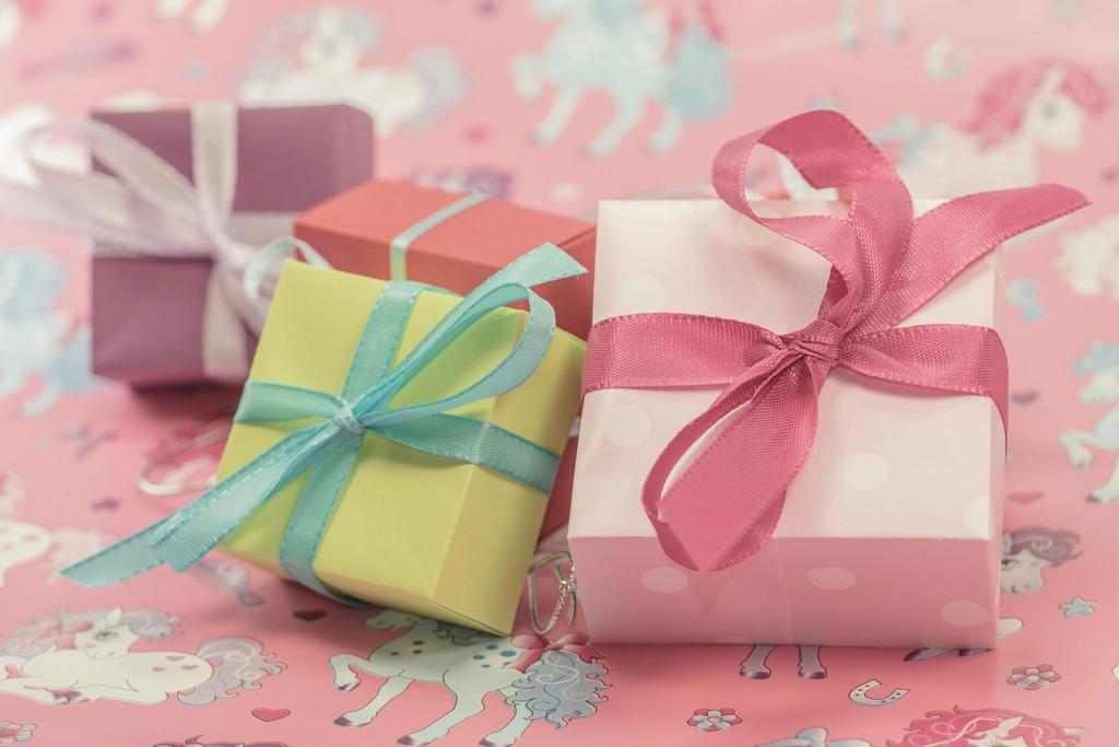 Stack of colourful wrapped gift boxes, representing packaging design for Dubai brands